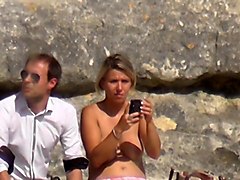 Topless blonde strip tease lingerie seethrough beach exhib